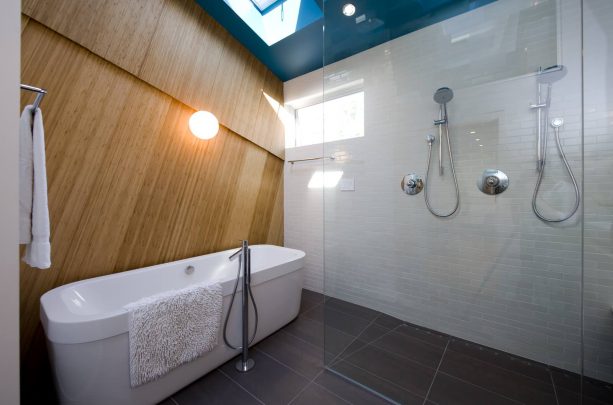 a blue ceiling and a bossy gray floor make a stunning contemporary bathroom