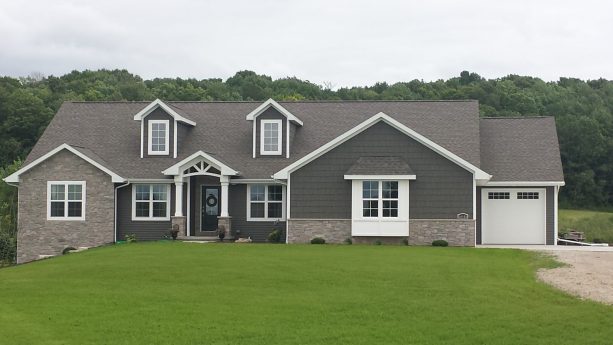 a combination of shadow vinyl siding and stone is perfect for a craftsman style ranch house