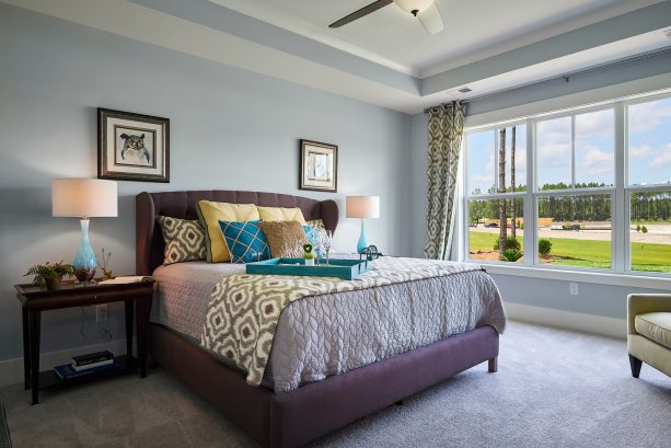 a mauve bed and some teal accents will steal the spotlight in your traditional bedroom