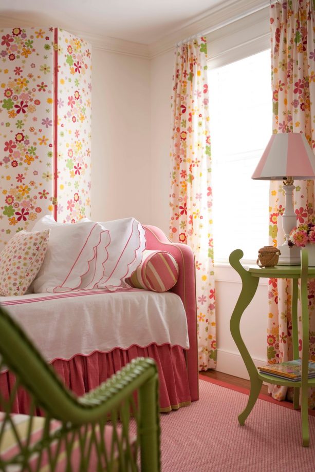 a pink bed and a matching carpet look astonishing in a bedroom with white walls