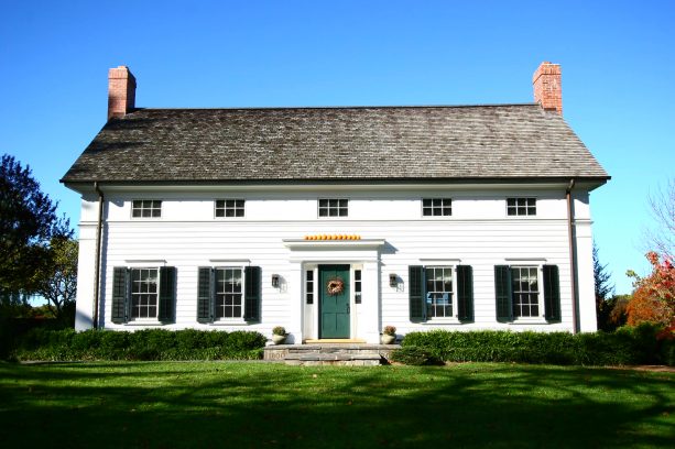 a farmhouse exterior will benefit from the addition of dark green shutters