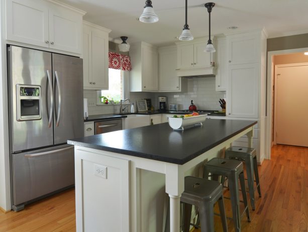 a ranch kitchen remodel project with breakfast bar and a large island