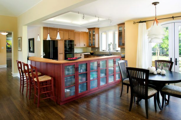 after remodel raised ranch kitchen with bar countertop and stained the new oak floors