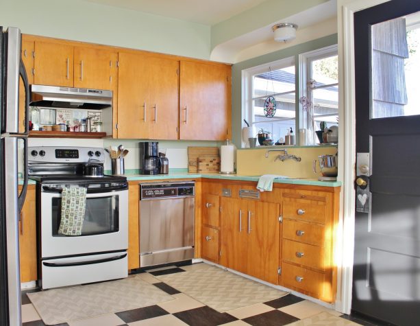 after remodel raised ranch kitchen with checkerboard floor tiles