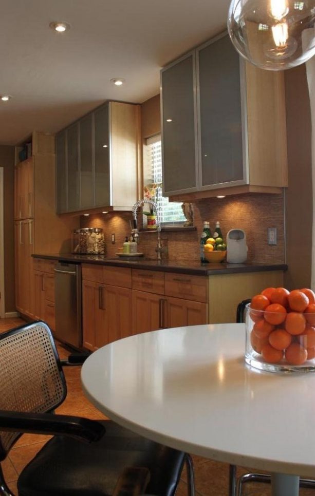 after remodel raised ranch kitchen with vintage cesca chairs