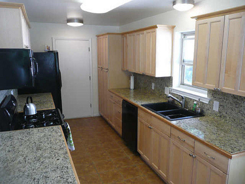 before remodel raised ranch kitchen with dated hardware