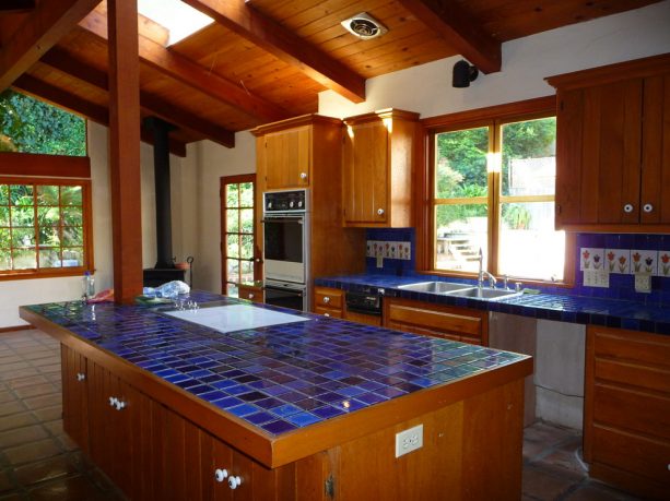 before the remodel the kitchen had these blue tiles
