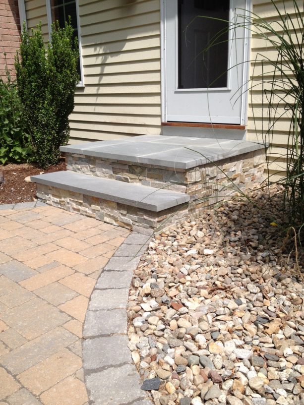 concrete and stone veneer covering go hand in hand with bluestone