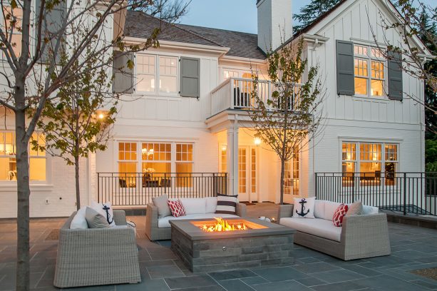 light gray shutters give a white house a modern appearance