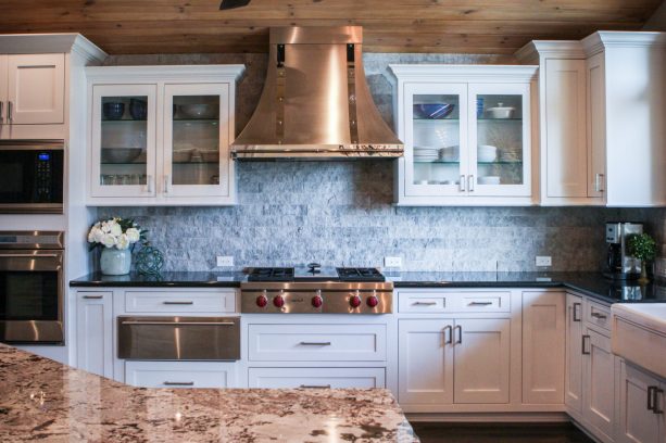 picture of the kitchen and the custom range hood