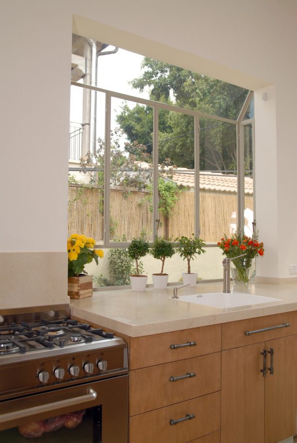 raised ranch kitchen remodel with a lot of space for sprouts, herbs, and various other plants