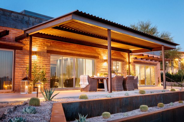 a b-decking metal roof concrete patio cover on a warm pergola