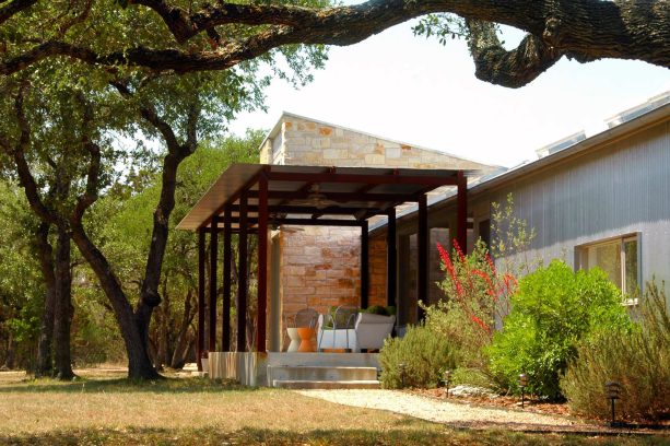 a conventional corrugated galvanized metal roof patio cover in the industrial style