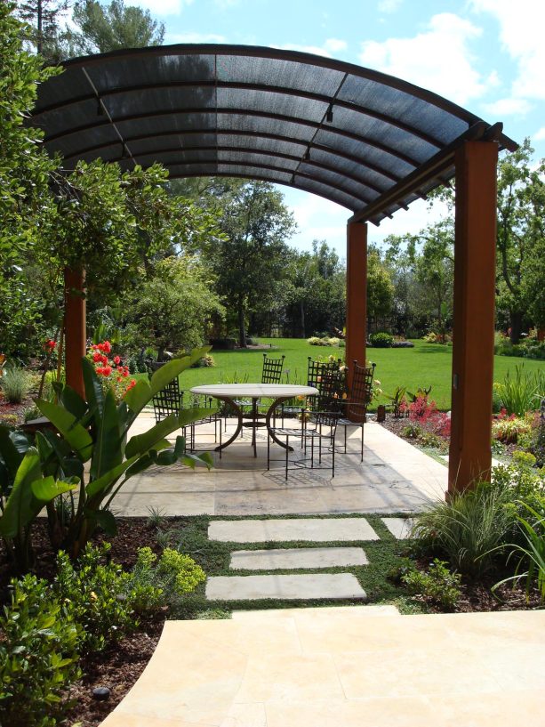 a hollow structural steel patio cover on a large tuscan patio