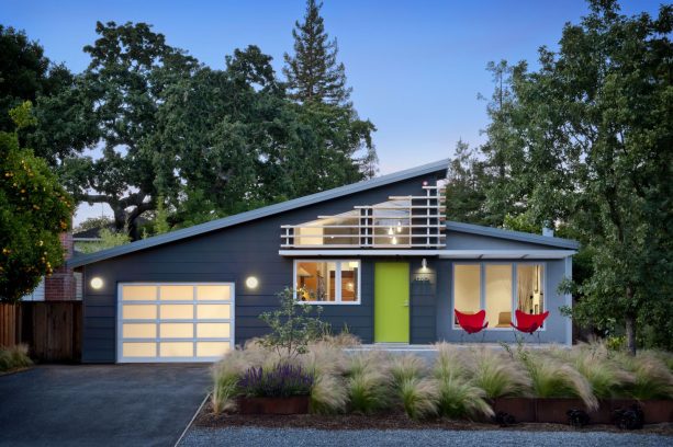 benjamin moore's tequila lime semi-gloss green front door on a midcentury exterior