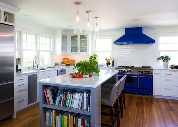 a stunning look that represents the beach style is a guarantee when gray and white inset cabinets are combined with a strong blue stove and exhaust