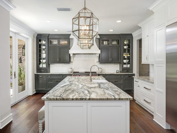 an overwhelming army of dark gray cabinets should be put together in a specific area while more underwhelming white cabinets are spread all over the place
