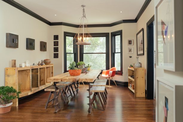 benjamin moore’s ebony king trims darker than benjamin moore’s muslin walls makes for a stunning industrial dining room