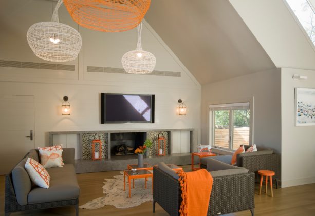 it’s amazing how much orange furniture pieces and ceiling lamp cover can improve the overall looks of a grey beach style living room