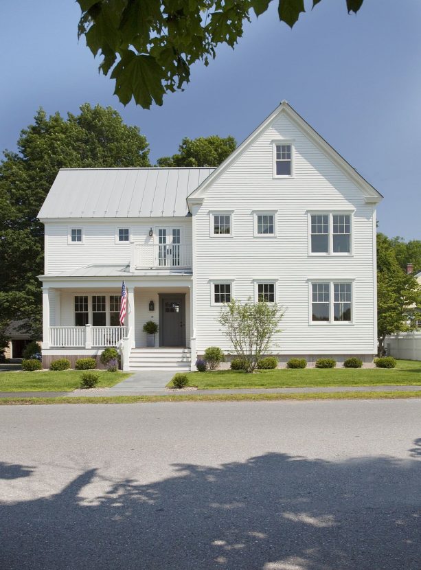 the combination of a benjamin moore amherst gray front door and a fiber cement siding painted in bell song makes sure that an eco-home looks elegant