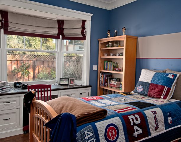 when a bay window gets a white wooden desk with a black top as a companion