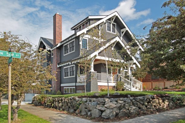 an iron-gray gable front porch makes a brilliant entrance to an arts and crafts home