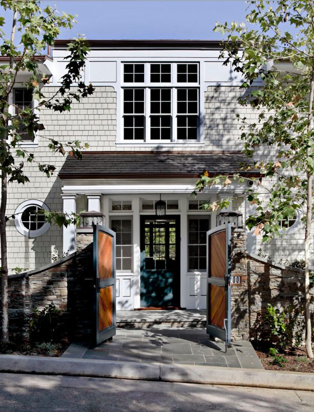 douglas fir colonial front door painted in benjamin moore - regent green in a classic entryway