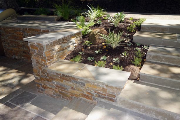 ledger stone veneer retaining wall in a modern style