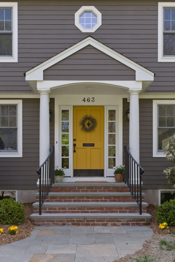 sherwin williams - glitzy gold colonial front door for a vibrant look