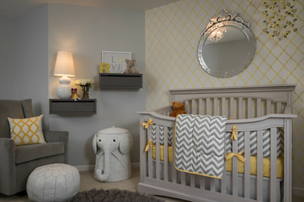 a white modern baby trellis accent wall in a nursery with ppg porter paint fog walls