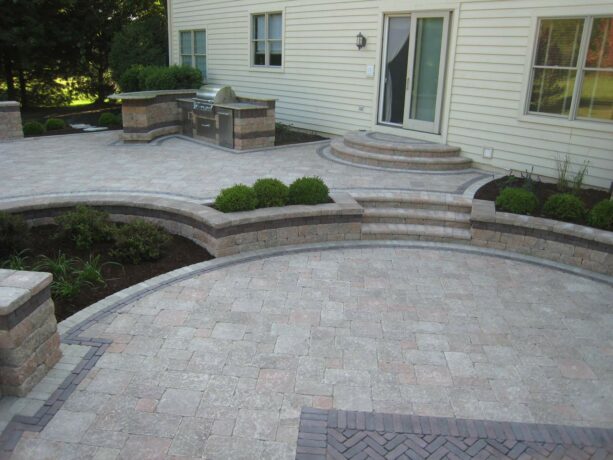 choosing grey bricks instead of red ones for a raised patio paver is actually a good idea to try