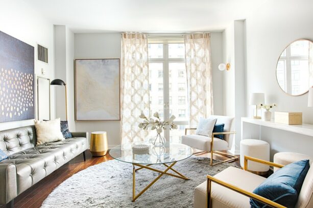 furniture pieces with gold feet are brilliant additions to a white living room