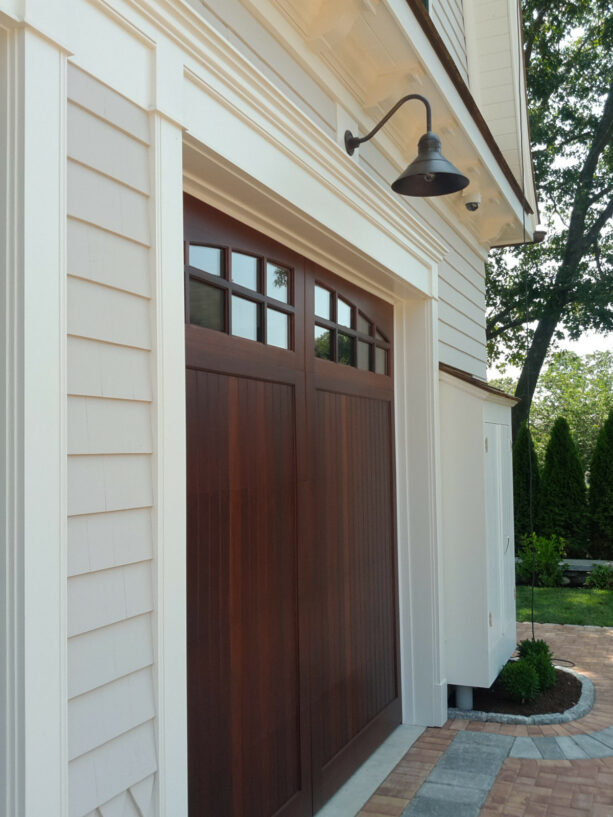 a colonial garage door trim suits a craftsman property