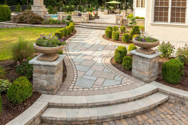 a curbing edging idea for multicolored slab paving for an irregular yet neat paver