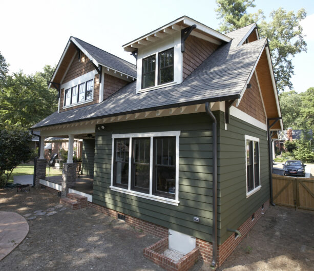 a james hardie artisan siding in sage green makes a homey residence