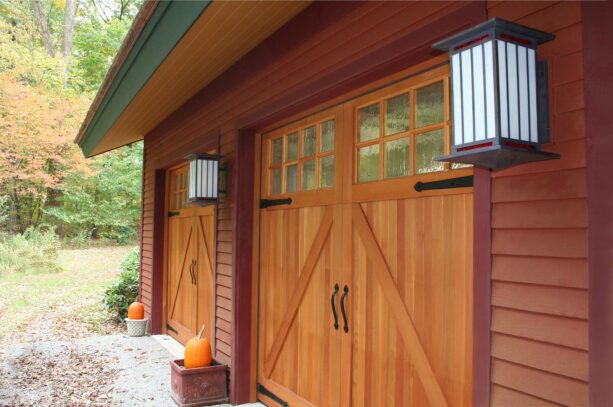 simple red door trims capture the soul of a craftsman garage well