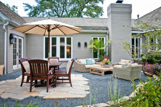 small-sized grey gravel suits a transitional crushed stone patio flawlessly