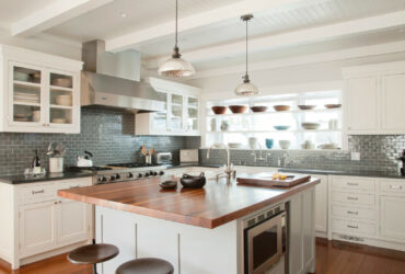 a beach-style kitchen deserves built-in window shelves