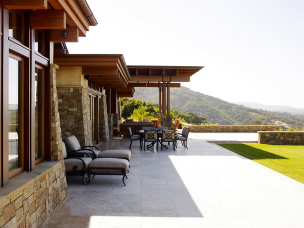 a patio cover with cedar trellis framing that connects it with nature