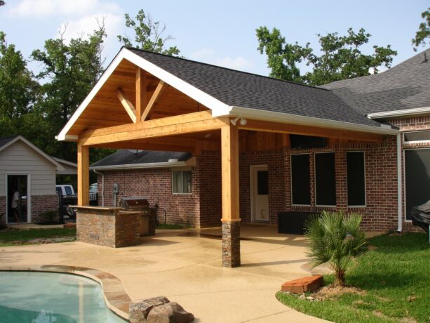 a raw cedar patio cover exudes the natural beauty of wood