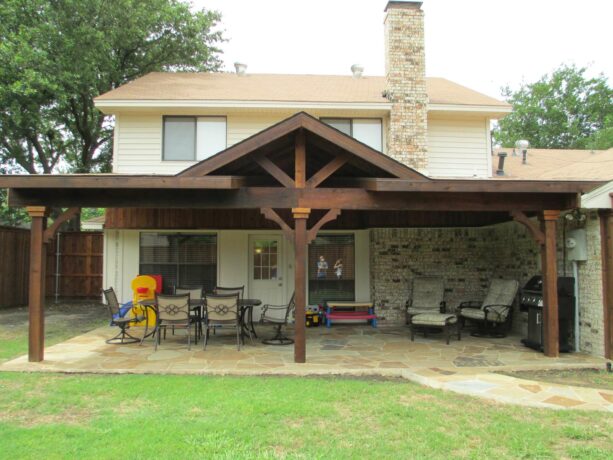 a red cedar patio cover gives an outdoor space a much-needed rustic look