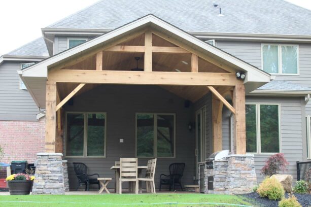 a soft-colored cedar patio cover for an unflashy yet elegant gathering area