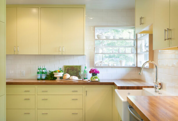 protruding built-in kitchen shelves on single pane aluminum windows