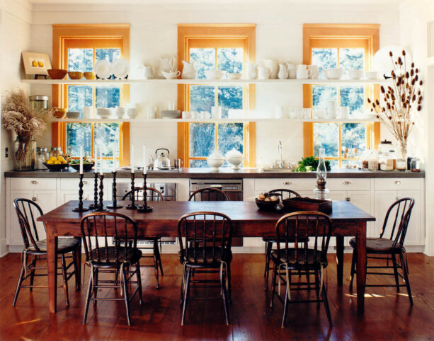 white super long floating kitchen wall shelves put against soft brown window trims